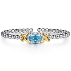 Gabriel & Co. 14K Yellow Gold and 925 Sterling Silver Oval Blue Topaz Bujukan Bangle Bracelet