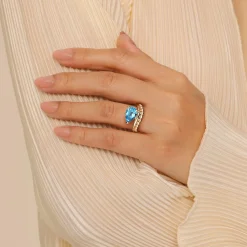 Outlet Gabriel & Co. 14K Yellow Gold Graduating Bujukan Pear Blue Topaz Curved Ring